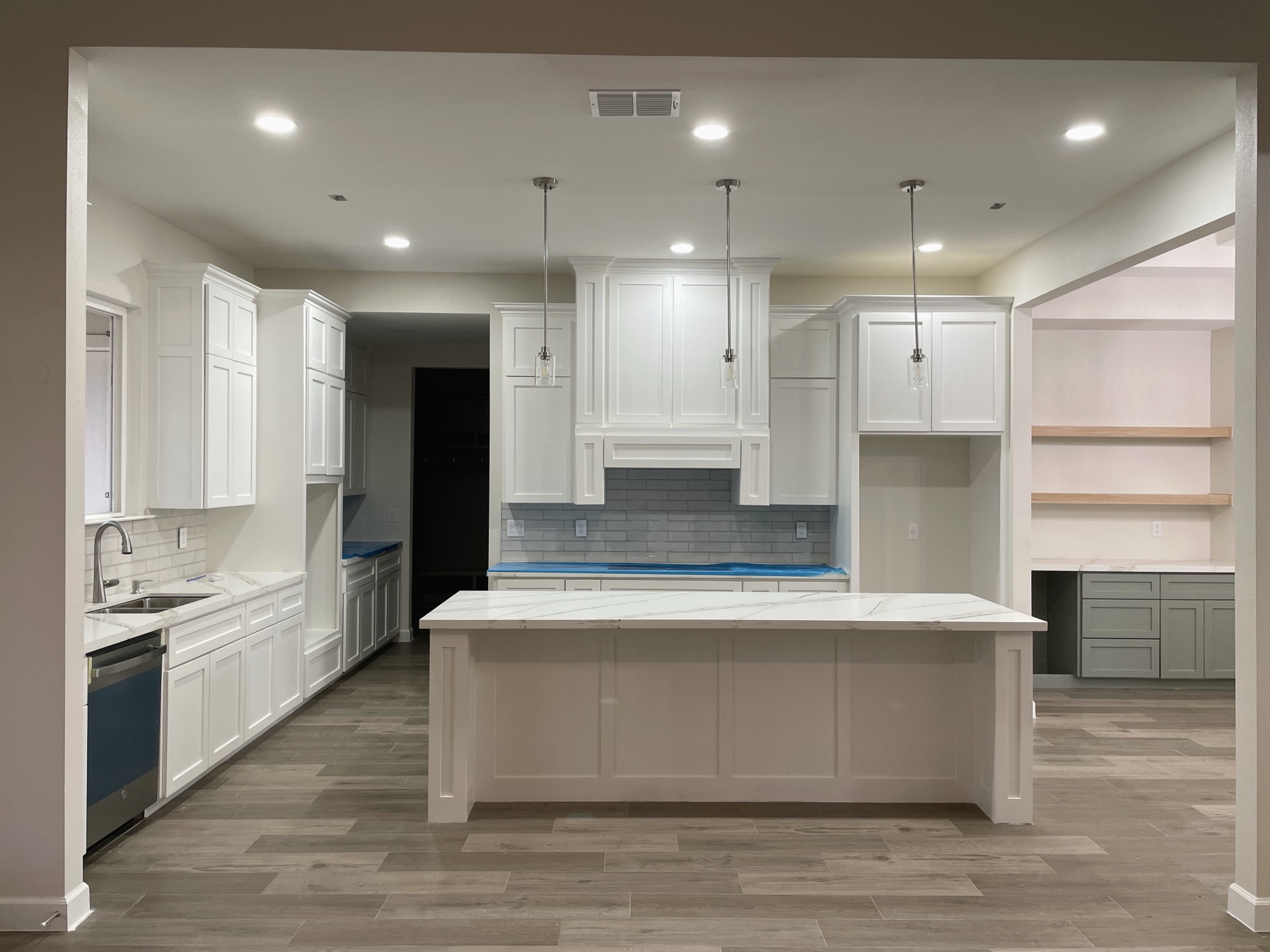 Kitchen with island and pendant lighting